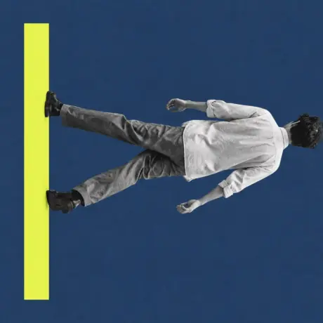 Collage of a man walking sideways up a wall towards a yellow bar